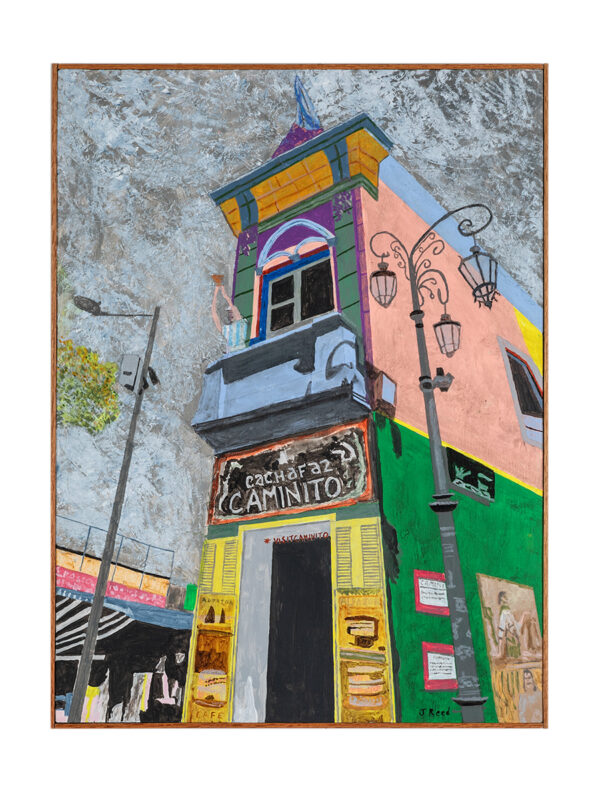 Colorful building with "Caminito" sign and lampposts.