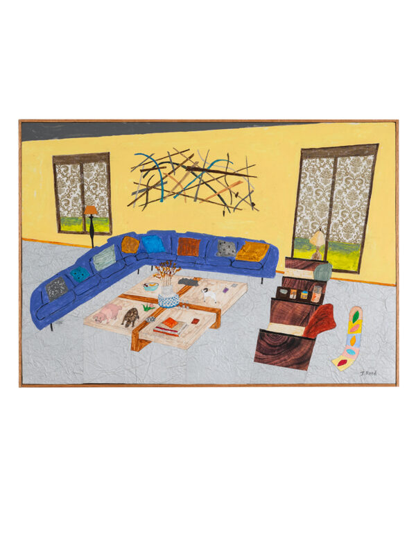 Colorful living room with blue sectional sofa.